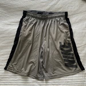 Nike Men’s gym shorts. Size Large. Grey and black.